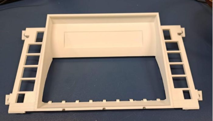 A front panel made using the INTAMSYS FUNMAT PRO 610HT with support material removed